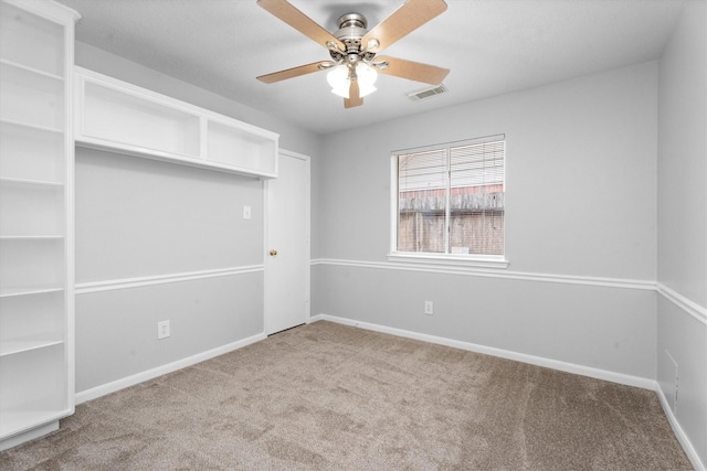 14306 Cypress Meadow Dr, Cypress, TX 77429 - carpeted spare room featuring a ceiling fan and baseboards