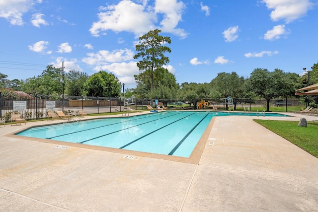 14306 Cypress Meadow Dr, Cypress, TX 77429 - community pool with a patio