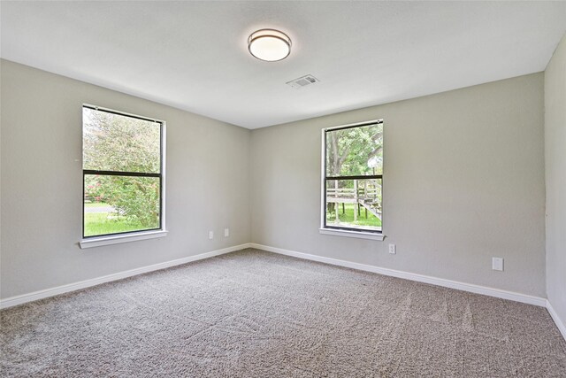 2131 6th Ave N, Texas City, TX 77590 - empty room with carpet floors and baseboards