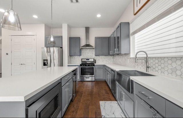 406 Yale Oaks Ln, Houston, TX 77091 - kitchen with appliances with stainless steel finishes, gray cabinets, wall chimney exhaust hood, beverage cooler, and backsplash