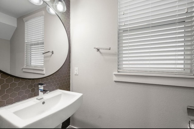 406 Yale Oaks Ln, Houston, TX 77091 - bathroom with backsplash and plenty of natural light
