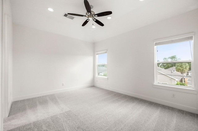 406 Yale Oaks Ln, Houston, TX 77091 - spare room with a ceiling fan, light carpet, and recessed lighting