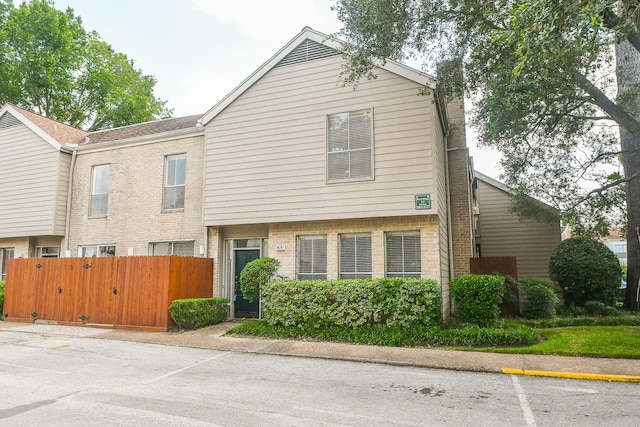 2100 Tanglewilde St Unit 169, Houston, TX 77063 - multi unit property featuring brick siding and uncovered parking