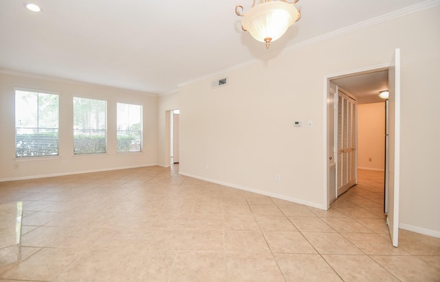 2100 Tanglewilde St Unit 169, Houston, TX 77063 - unfurnished room featuring ornamental molding and light tile patterned floors
