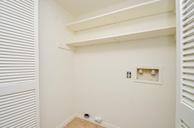 2100 Tanglewilde St Unit 169, Houston, TX 77063 - laundry room featuring washer hookup, hookup for an electric dryer, and light tile patterned floors