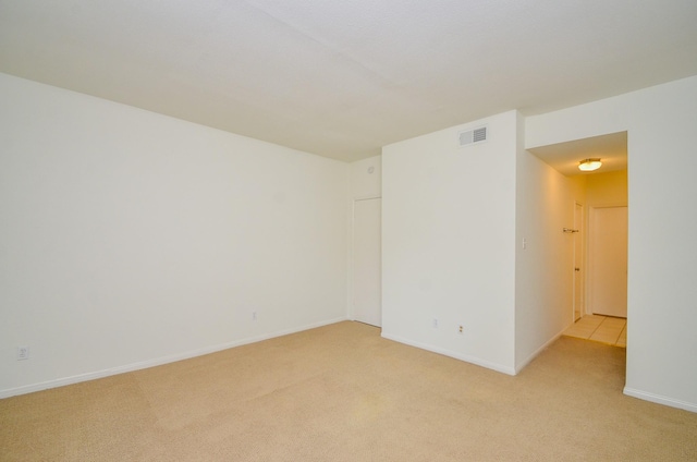 2100 Tanglewilde St Unit 169, Houston, TX 77063 - spare room with light carpet and baseboards