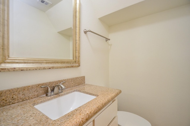 2100 Tanglewilde St Unit 169, Houston, TX 77063 - bathroom featuring vanity and toilet