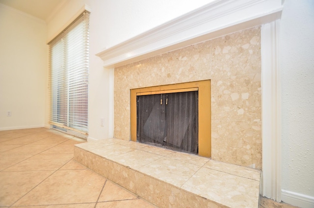 2100 Tanglewilde St Unit 169, Houston, TX 77063 - detailed view of a tile fireplace and ornamental molding