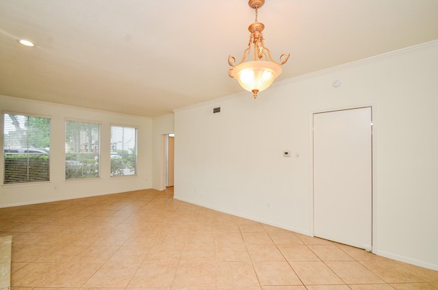 2100 Tanglewilde St Unit 169, Houston, TX 77063 - empty room featuring ornamental molding and light tile patterned floors