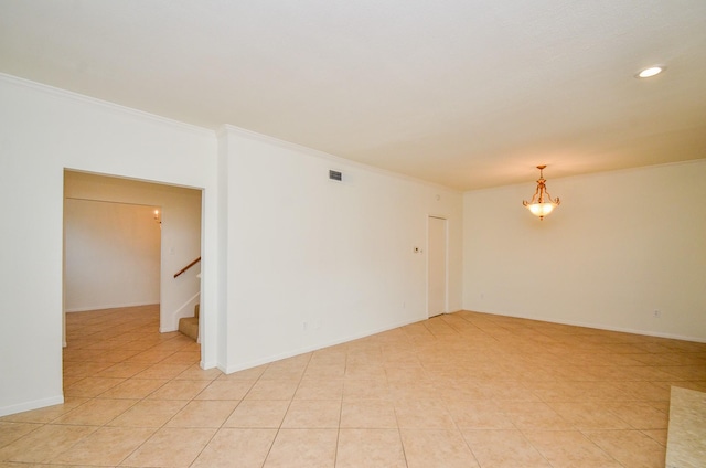 2100 Tanglewilde St Unit 169, Houston, TX 77063 - spare room with crown molding, stairs, light tile patterned flooring, and recessed lighting