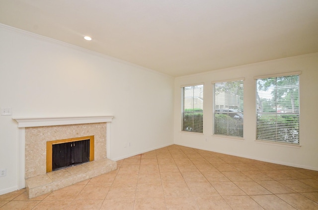 2100 Tanglewilde St Unit 169, Houston, TX 77063 - unfurnished living room featuring ornamental molding, tile patterned flooring, a high end fireplace, and recessed lighting