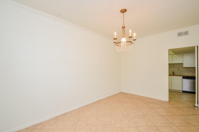 2100 Tanglewilde St Unit 169, Houston, TX 77063 - empty room with a chandelier, crown molding, and light tile patterned floors