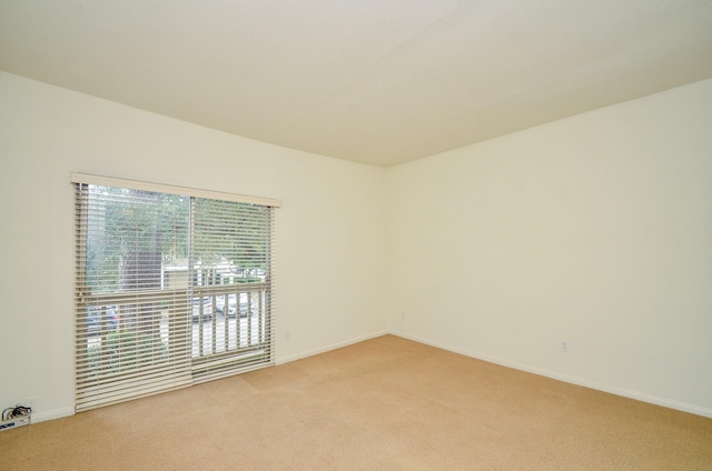 2100 Tanglewilde St Unit 169, Houston, TX 77063 - unfurnished room with light carpet and baseboards