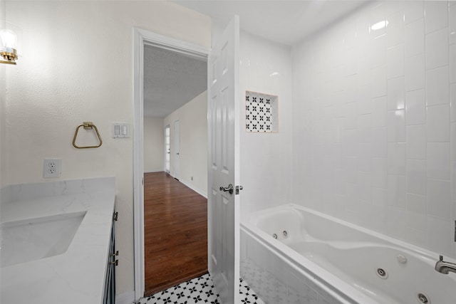 8114 Coolshire Ln, Houston, TX 77070 - full bathroom with a sink and a combined bath / shower with jetted tub
