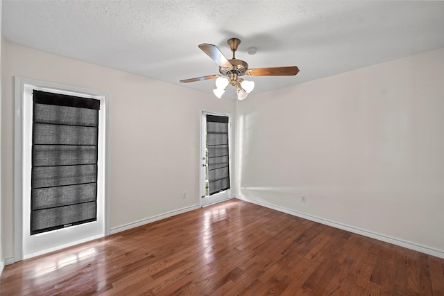 8114 Coolshire Ln, Houston, TX 77070 - empty room with wood finished floors, a ceiling fan, and a smoke detector