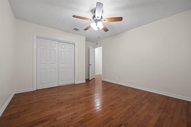 8114 Coolshire Ln, Houston, TX 77070 - unfurnished bedroom with wood finished floors, a closet, a textured ceiling, and ceiling fan