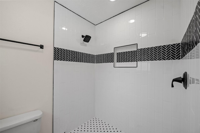 8114 Coolshire Ln, Houston, TX 77070 - bathroom featuring toilet and tiled shower