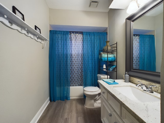11614 Taos Ln, Houston, TX 77070 - full bathroom featuring wood finished floors, vanity, and shower / bathtub combination with curtain