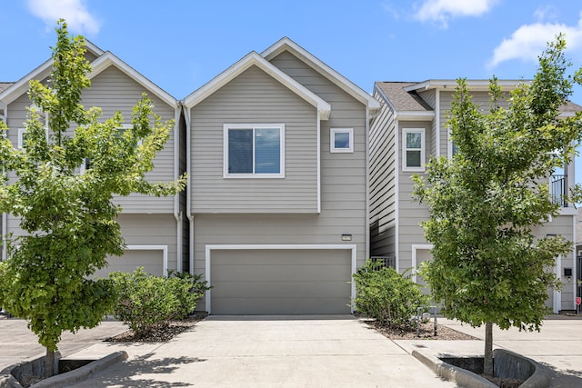 1907 Harlem St Unit A, Houston, TX 77020 - view of property with a garage and concrete driveway