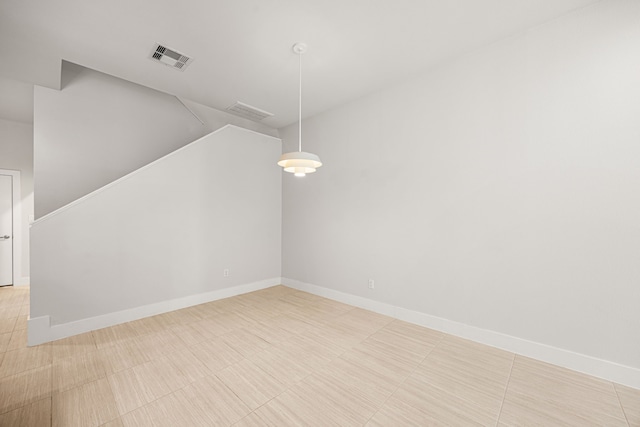 1907 Harlem St Unit A, Houston, TX 77020 - empty room featuring baseboards and vaulted ceiling