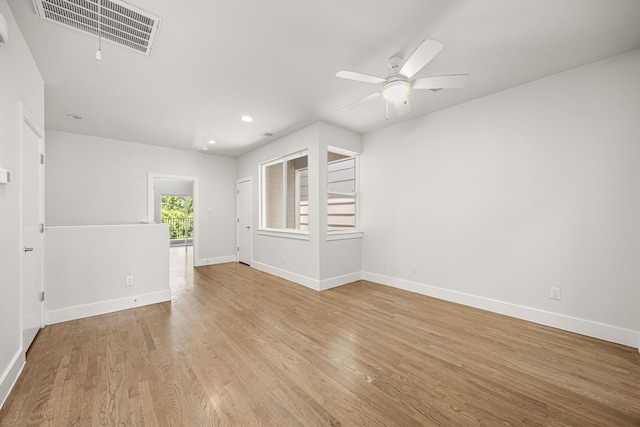 1907 Harlem St Unit A, Houston, TX 77020 - spare room with a ceiling fan, recessed lighting, and light wood-style floors