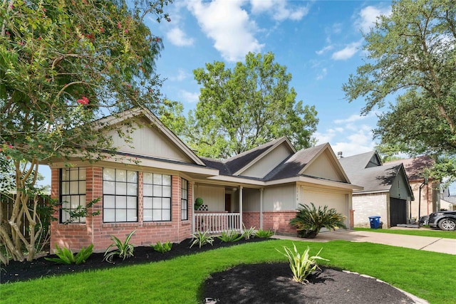 1710 Blue Heather Ln, Fresno, TX 77545 - ranch-style home with brick siding, a front lawn, a garage, and covered porch