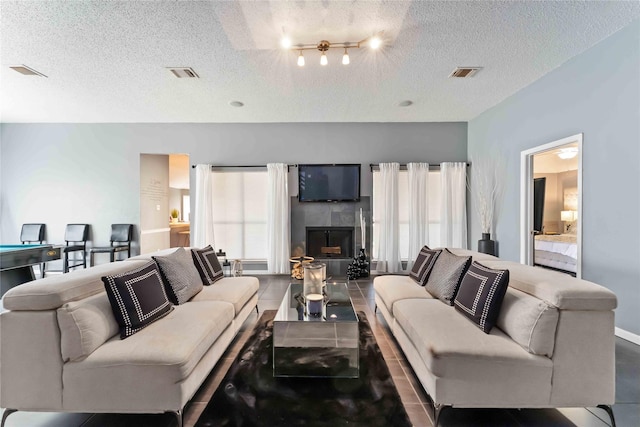 1710 Blue Heather Ln, Fresno, TX 77545 - living room with a textured ceiling