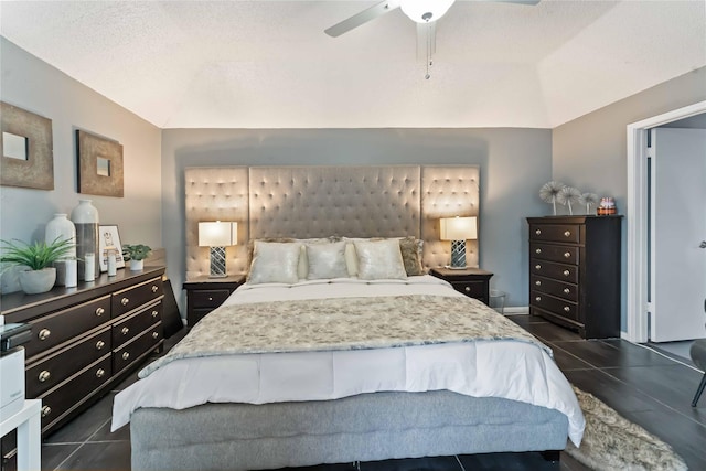 1710 Blue Heather Ln, Fresno, TX 77545 - bedroom featuring dark tile patterned floors, vaulted ceiling, and ceiling fan