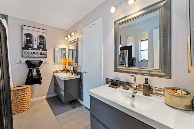 1710 Blue Heather Ln, Fresno, TX 77545 - bathroom with vanity and baseboards