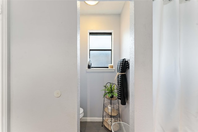 1710 Blue Heather Ln, Fresno, TX 77545 - bathroom featuring toilet and wood finished floors