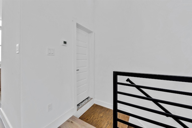 1805 Emir St Unit E, Houston, TX 77009 - stairway featuring wood finished floors and baseboards