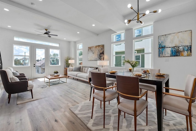 1805 Emir St Unit E, Houston, TX 77009 - dining room with light wood-style flooring, a chandelier, beam ceiling, recessed lighting, and a ceiling fan