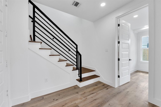 1805 Emir St Unit E, Houston, TX 77009 - stairs featuring recessed lighting and wood finished floors