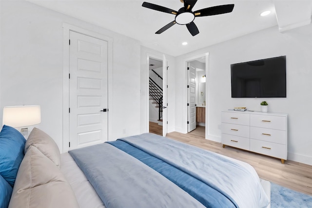 1805 Emir St Unit E, Houston, TX 77009 - bedroom with light wood-type flooring, recessed lighting, ensuite bath, and a ceiling fan