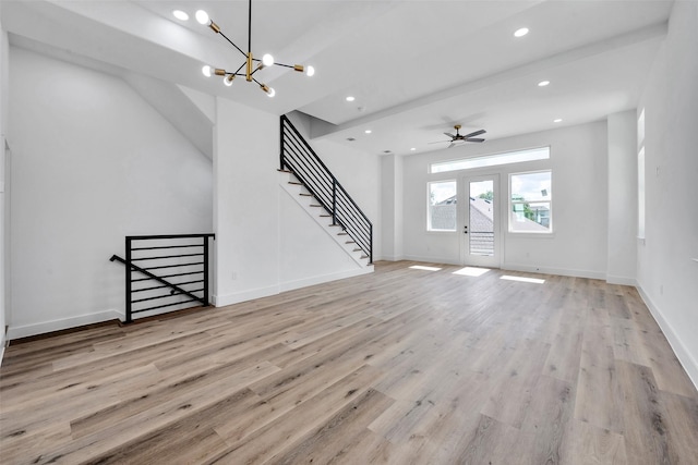 1805 Emir St Unit E, Houston, TX 77009 - unfurnished living room with light wood finished floors, a chandelier, recessed lighting, stairs, and ceiling fan