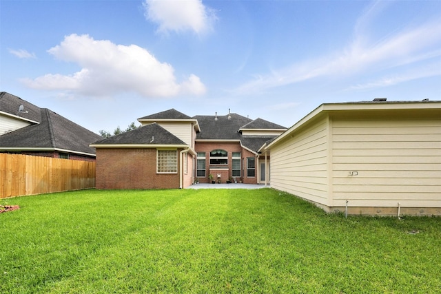 21306 Willowford Park Dr, Katy, TX 77450 - rear view of property with a patio and roof with shingles