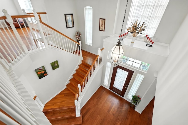 21306 Willowford Park Dr, Katy, TX 77450 - entrance foyer featuring a high ceiling, wood finished floors, and stairway