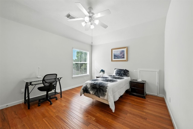 21306 Willowford Park Dr, Katy, TX 77450 - bedroom with wood finished floors and a ceiling fan