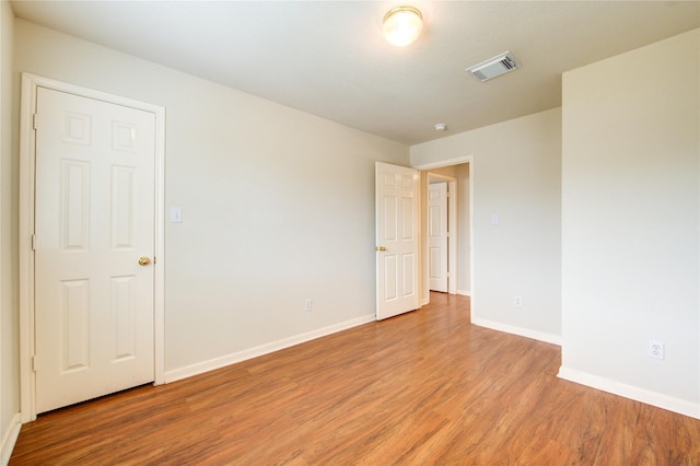 21306 Branford Hills Ln, Katy, TX 77450 - empty room with light wood-style floors and baseboards