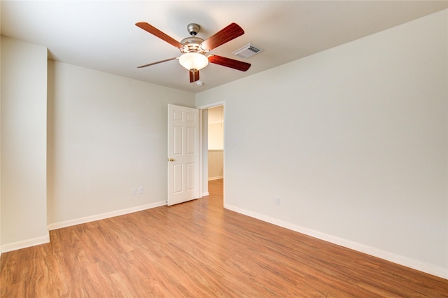 21306 Branford Hills Ln, Katy, TX 77450 - spare room with light wood-style floors and ceiling fan