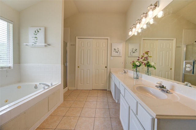21306 Branford Hills Ln, Katy, TX 77450 - full bath featuring double vanity, tile patterned flooring, a tub with jets, a shower stall, and lofted ceiling