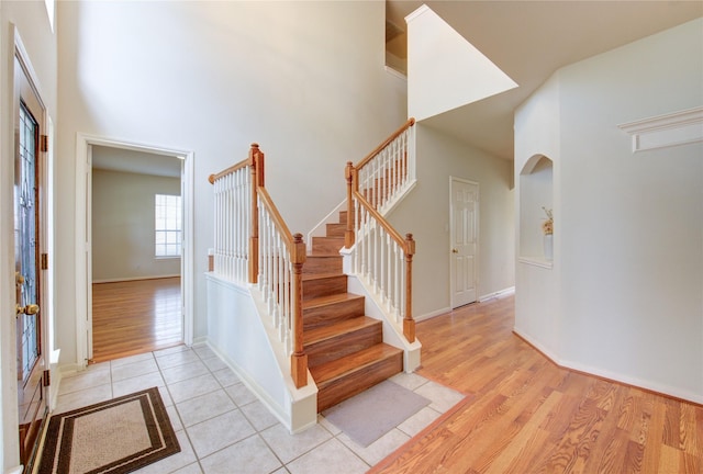 21306 Branford Hills Ln, Katy, TX 77450 - stairs with a towering ceiling and wood finished floors