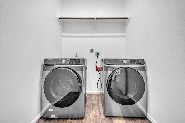 16114 Northern Cardinal Ln, Cypress, TX 77433 - washroom featuring independent washer and dryer and wood finished floors