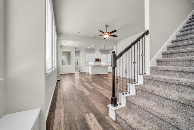 16114 Northern Cardinal Ln, Cypress, TX 77433 - entryway featuring stairway, ceiling fan, dark wood finished floors, and recessed lighting