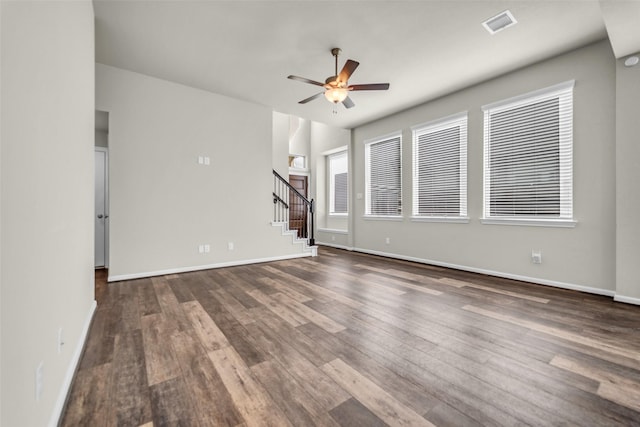 16114 Northern Cardinal Ln, Cypress, TX 77433 - unfurnished living room featuring a ceiling fan, stairs, and wood finished floors