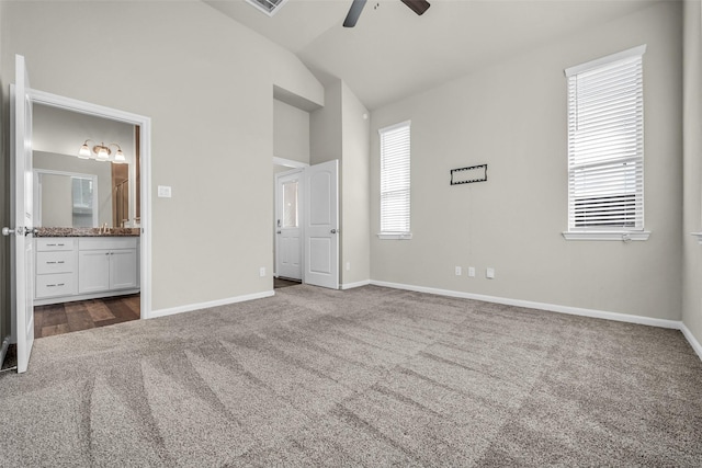 16114 Northern Cardinal Ln, Cypress, TX 77433 - unfurnished bedroom with carpet flooring, connected bathroom, ceiling fan, and high vaulted ceiling