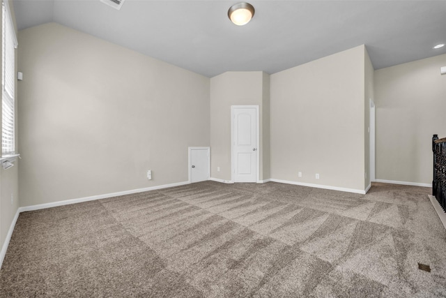 16114 Northern Cardinal Ln, Cypress, TX 77433 - spare room featuring carpet flooring and vaulted ceiling