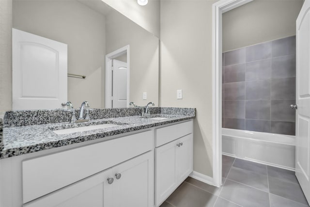 16114 Northern Cardinal Ln, Cypress, TX 77433 - bathroom with tile patterned flooring, double vanity, and bathing tub / shower combination