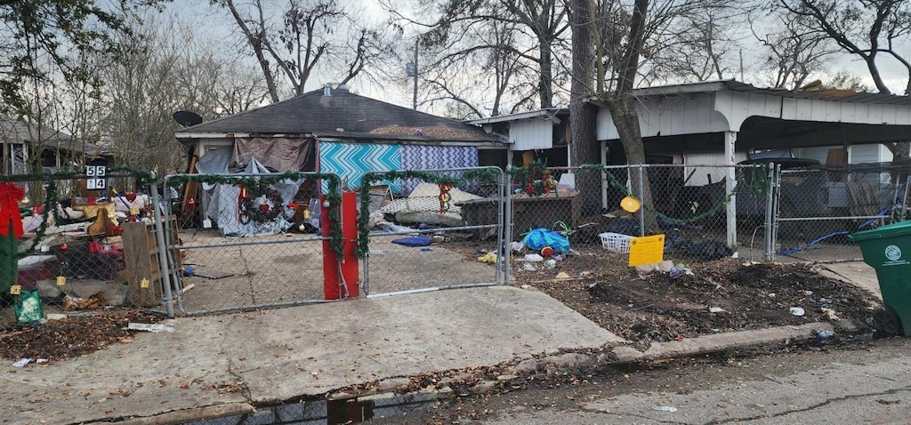 5514 Malmedy Rd, Houston, TX 77033 - view of playground featuring a fenced front yard and a gate