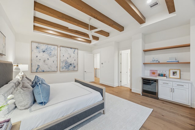 1310 Willard, Houston, TX 77006 - bedroom with beverage cooler, beam ceiling, light wood-type flooring, and a bar